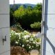 View through the shutters of a maison de village in Lourmarin, Provence, France