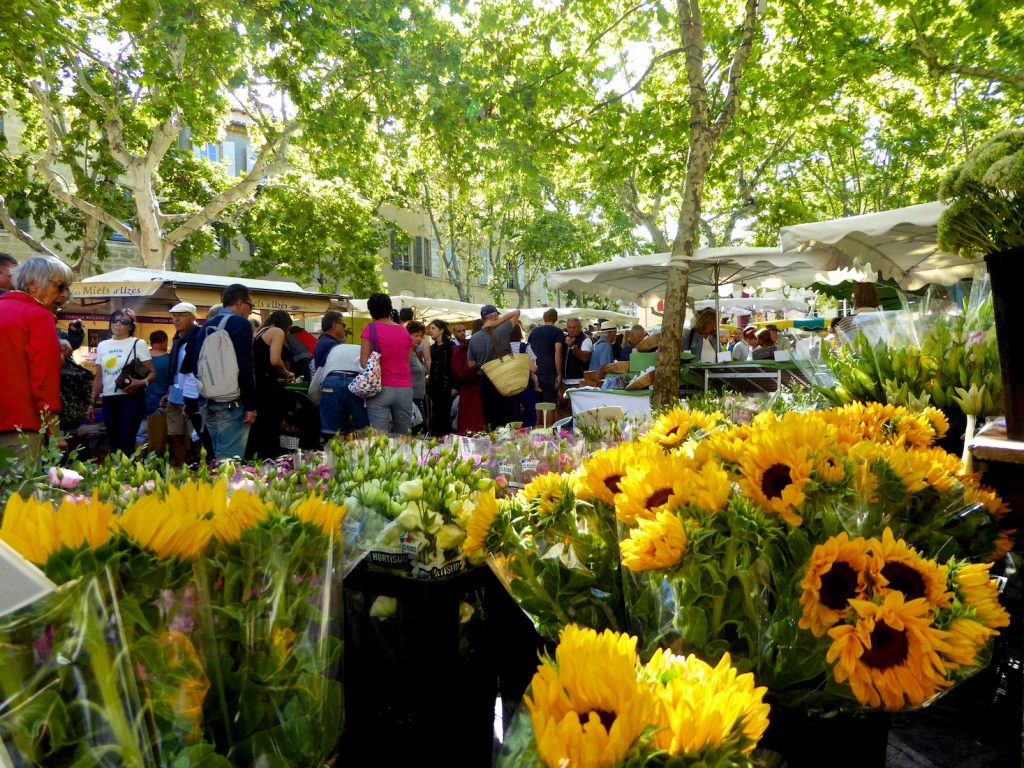 Shutters and sunflowers Sunflowers in a Provence market