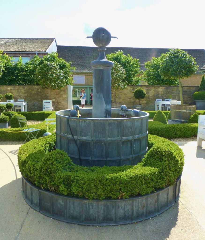 Topiary courtyard at Daylesford Barns, Gloucestershire, The Cotswolds, UK